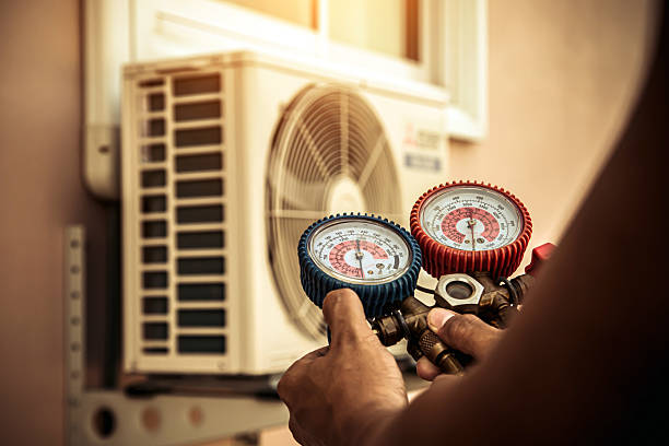 Professional Ductwork Repair technician working in Northbridge, MA